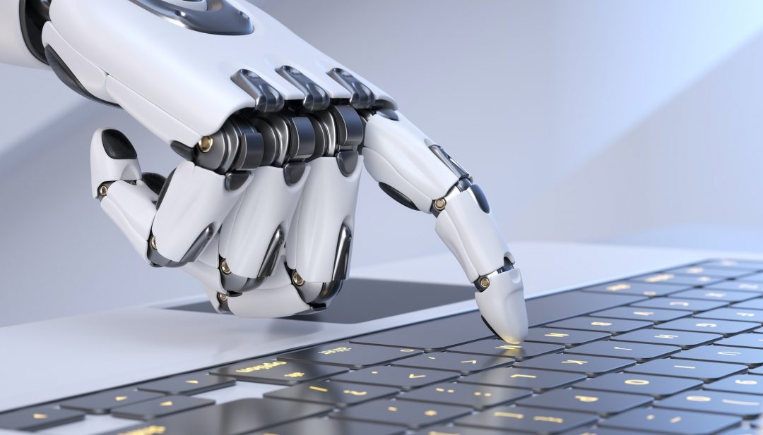 white-robot-cyborg-hand-pressing-a-keyboard-on-a-laptop